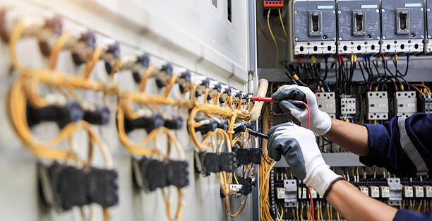 Professional Electrician technician working in Myrtle Grove, FL
